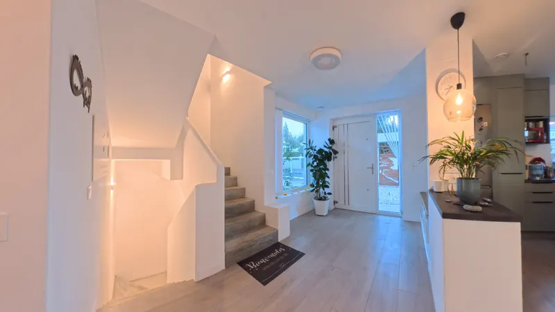 Entrance Foyer: «Bienvenidos» Mat & Floating Staircase